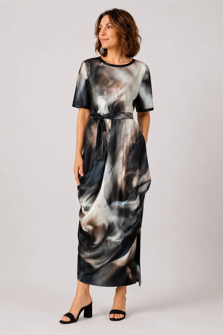 Side view of the multicolored Xenia printed dress for women with a tied belt - Valérie Simon