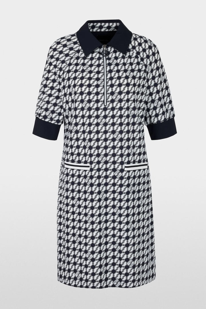 Robe courte en jersey scuba, imprimé géométrique, col classique, poches plaquées et fermeture éclair.