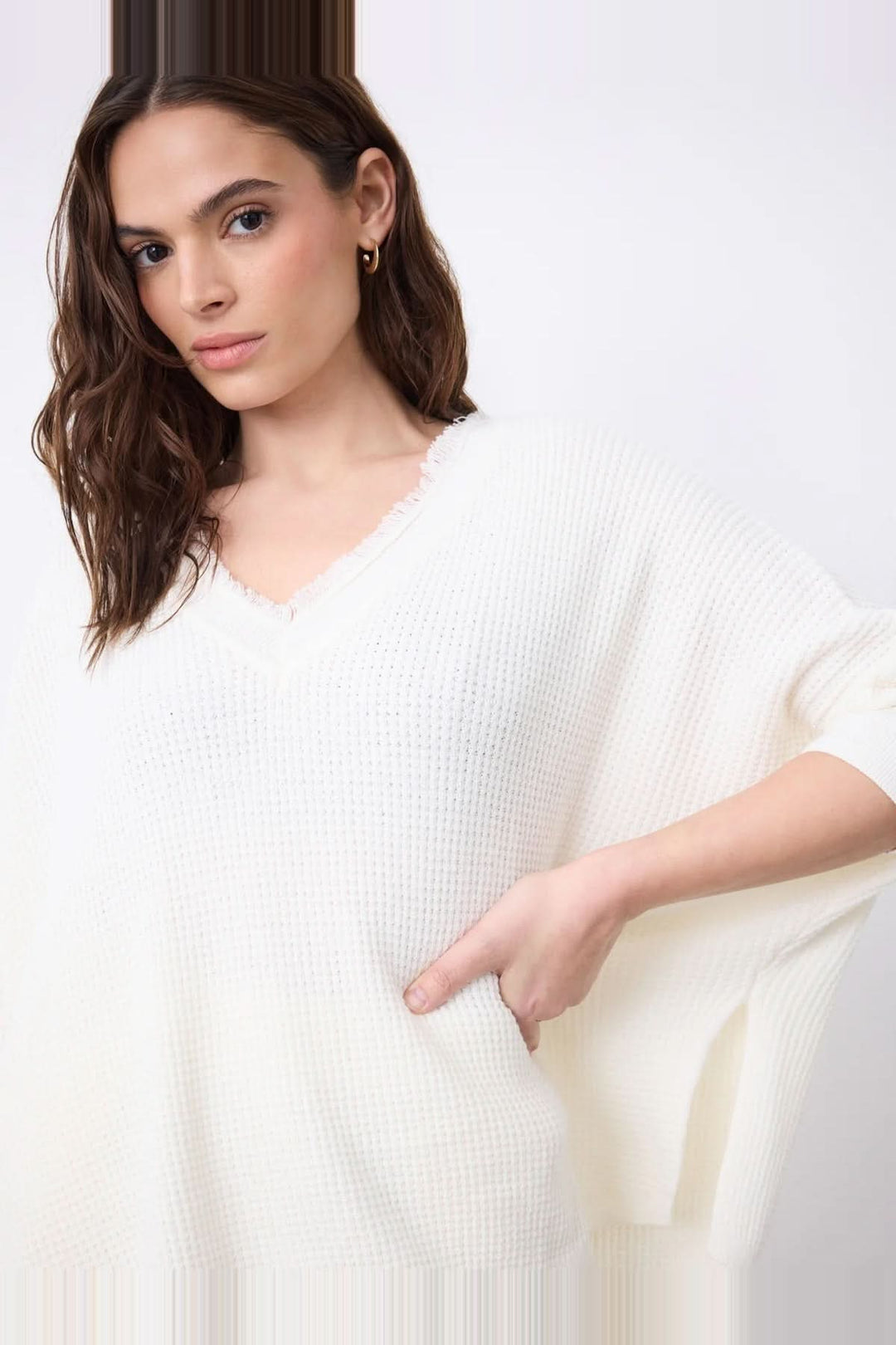 V-neck poncho sweater with three-quarter sleeves