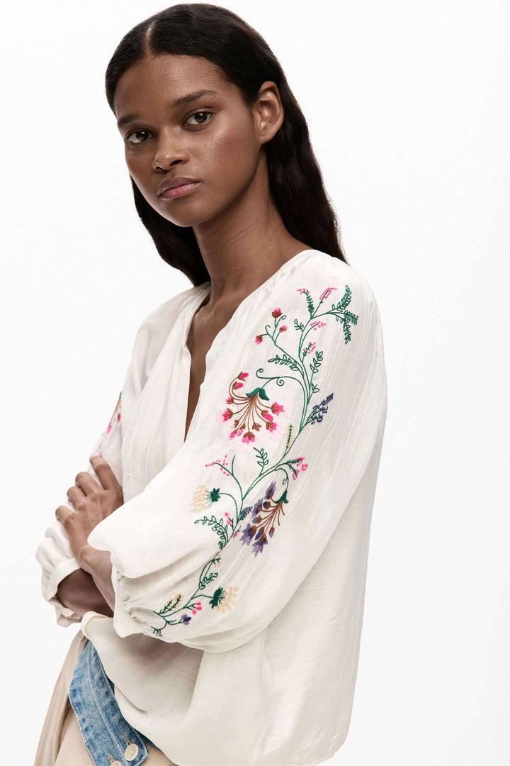 Flowy blouse with embroidered sleeves