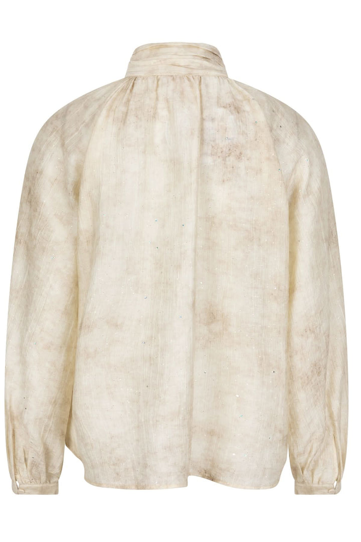 Blouse à col lavallière, dos, en tissu légèrement irisé et vaporeux, idéale pour un look chic et élégant.