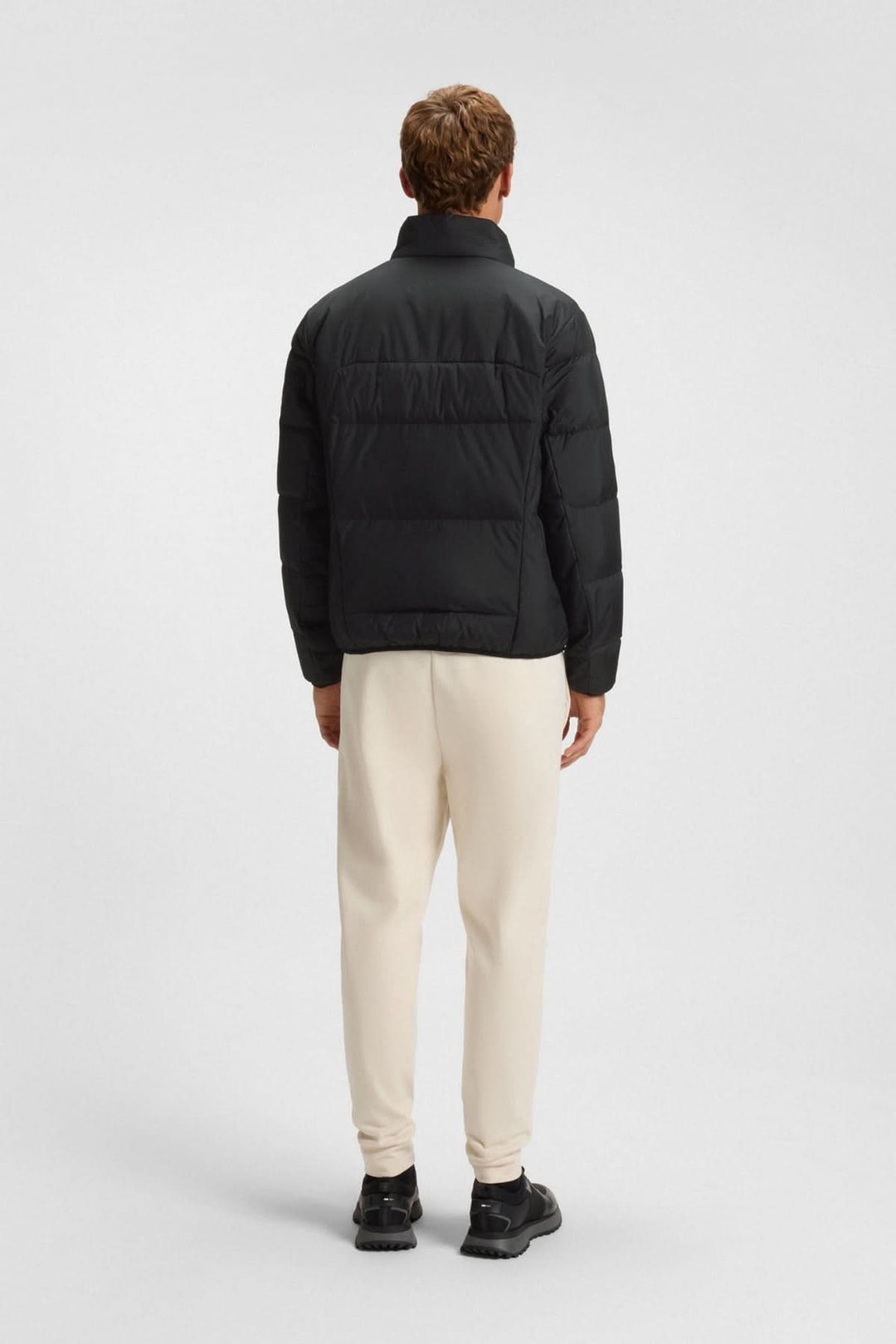 Manteau matelassé déperlant en duvet avec poche sur la manche