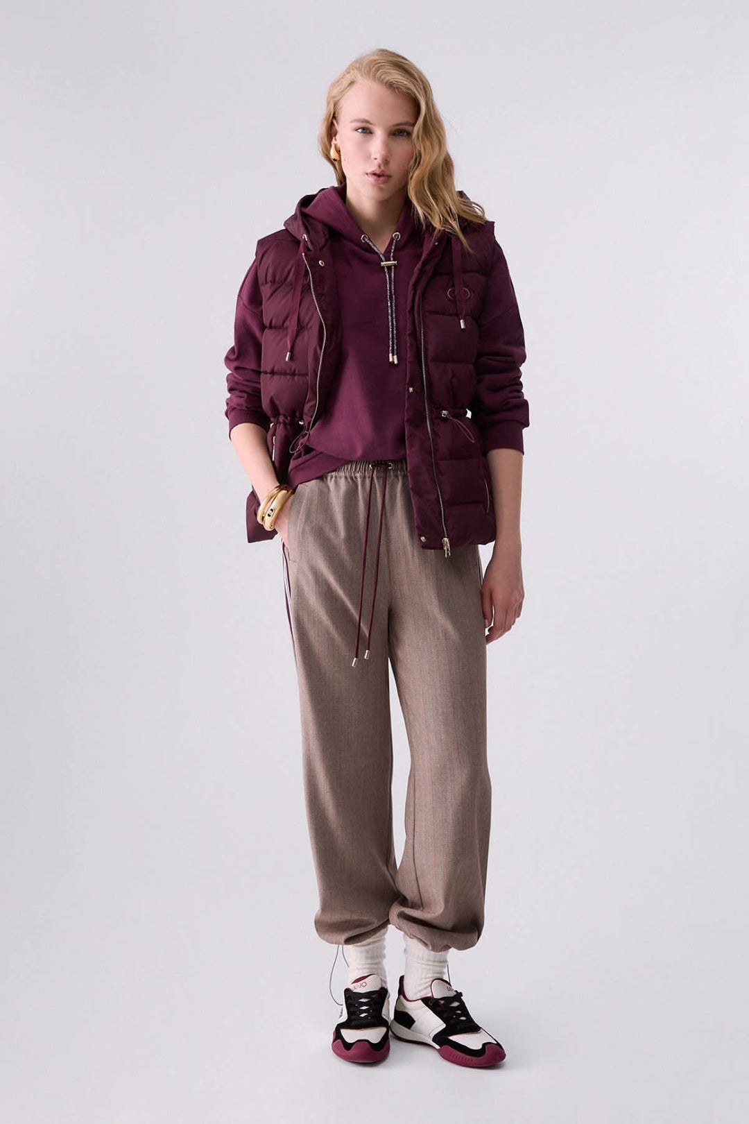 Veste matelassée sans manches à capuchon pour femme liujo