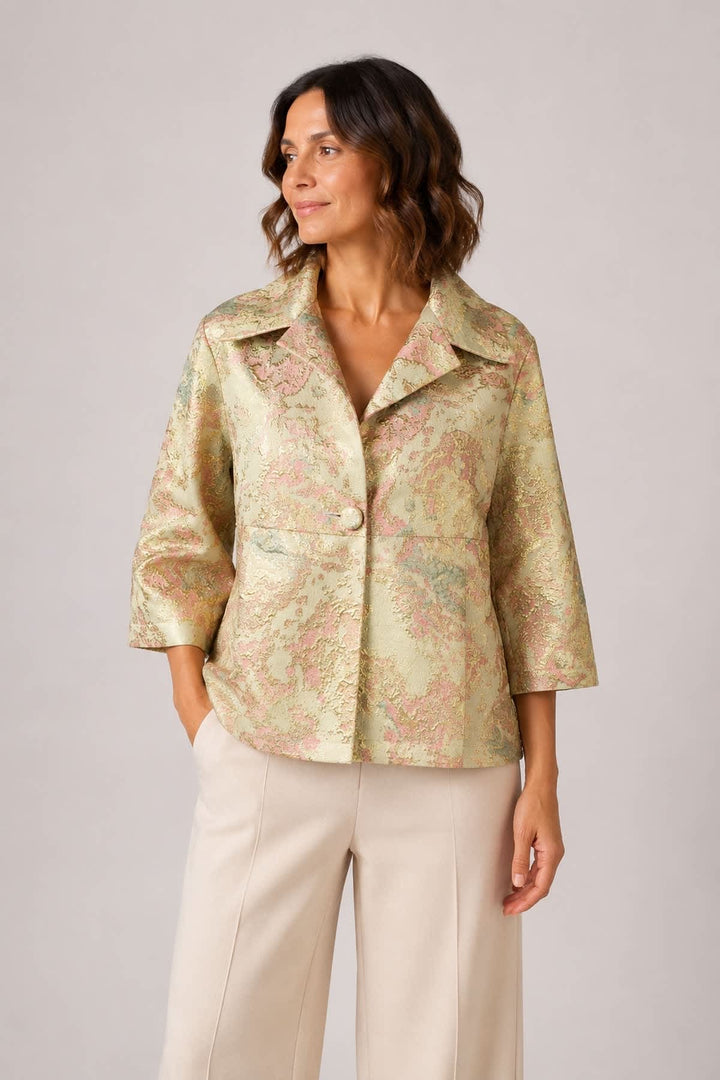 Side view of a gold brocade women&