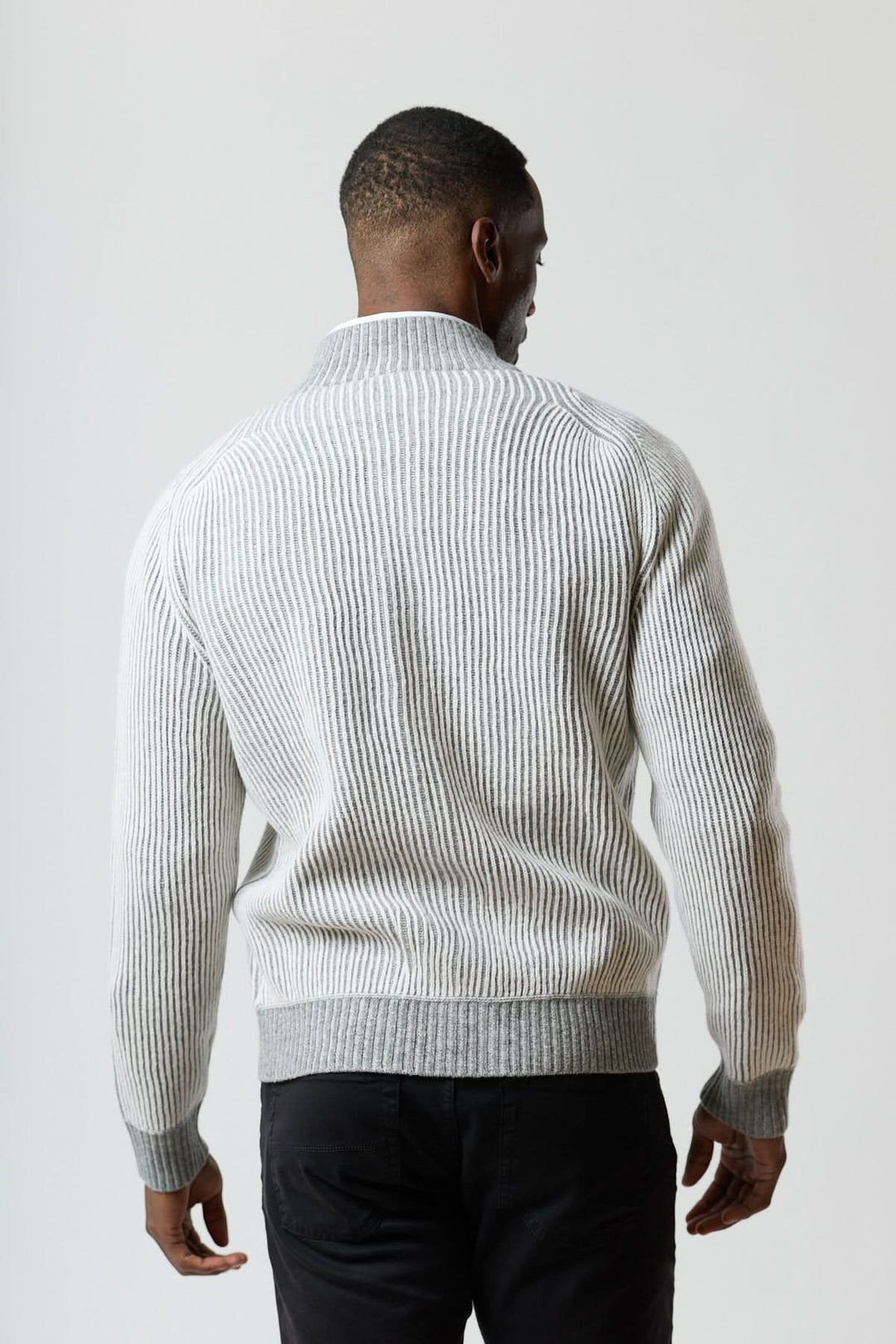 High-neck zippered sweater in ribbed knit