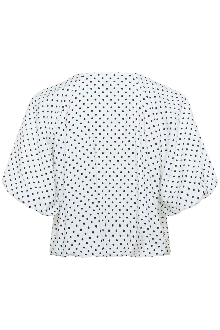 Blouse Gwen à pois avec encolure en V, vue arrière, style ample et aérien, idéale pour un look moderne.
