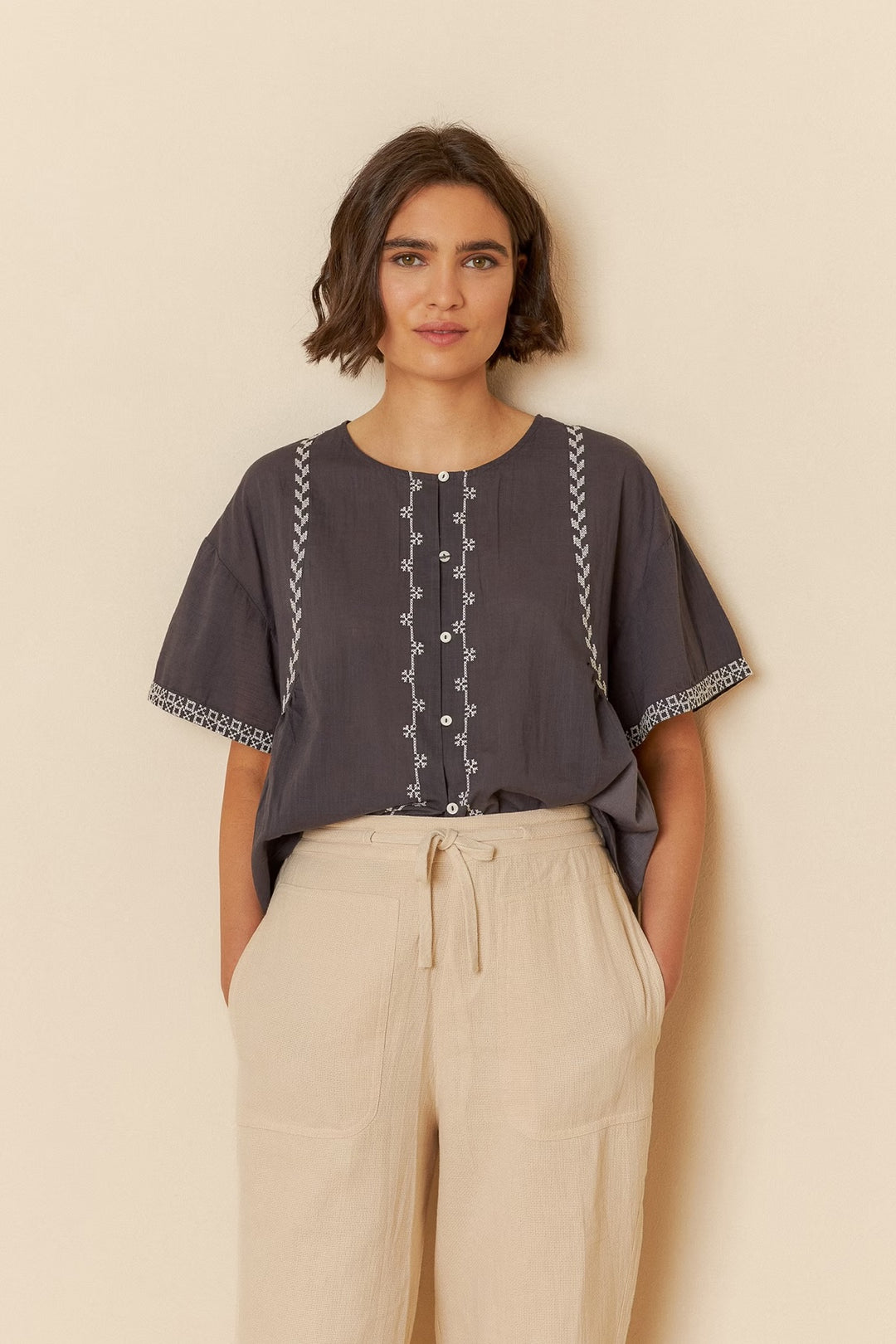 Embroidered trapeze blouse