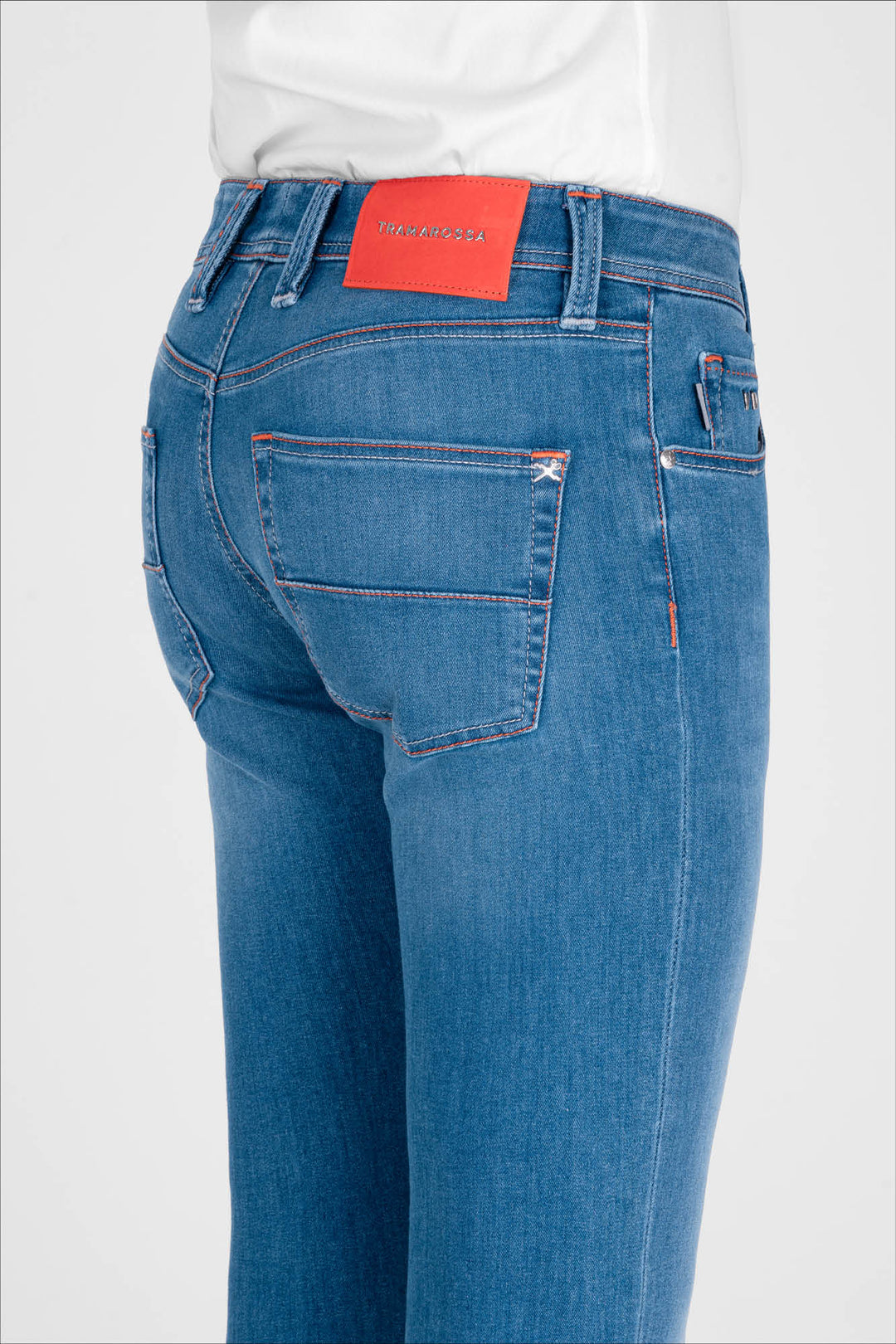 Blue jeans with orange contrast