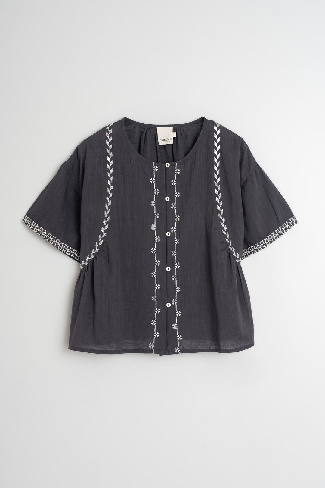 Embroidered trapeze blouse