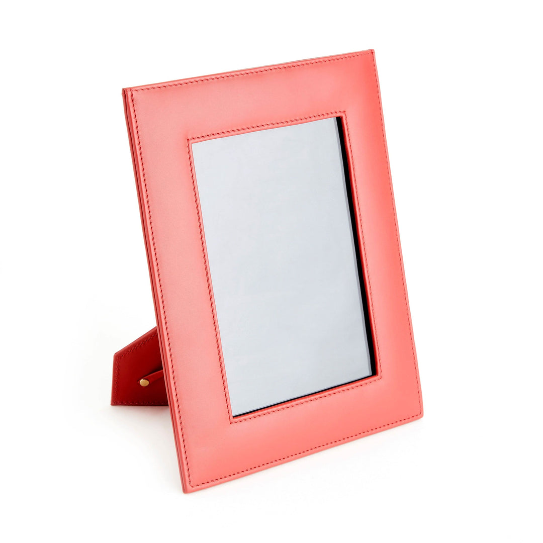 5x7 leather picture frame in vibrant coral with rear drop-down door for easy photo access.