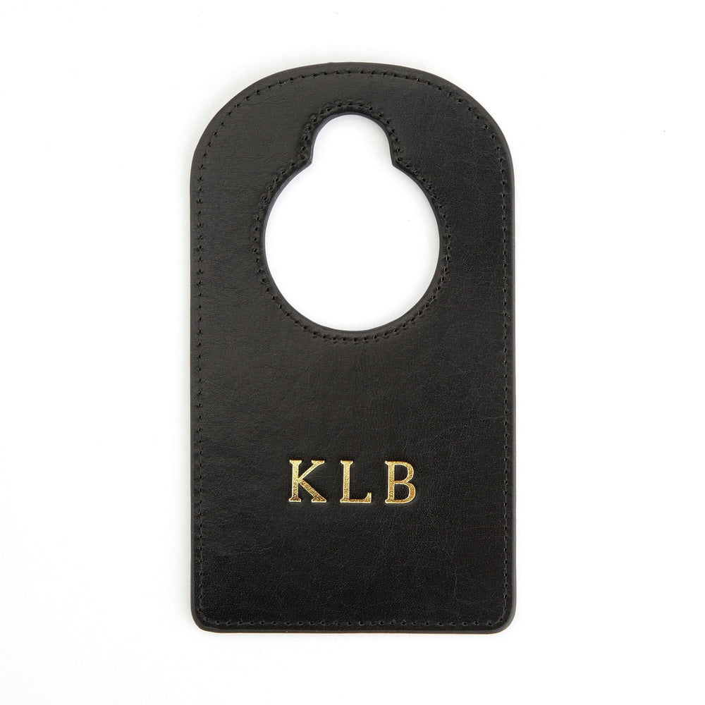 Handcrafted leather door knob hanger with gold monogram KLB, perfect for personalizing your bedroom or nursery decor.