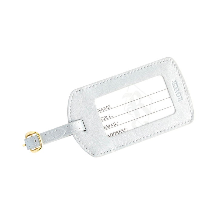 Handcrafted leather luggage tag with gold tone hardware and personalization options for travel enthusiasts.