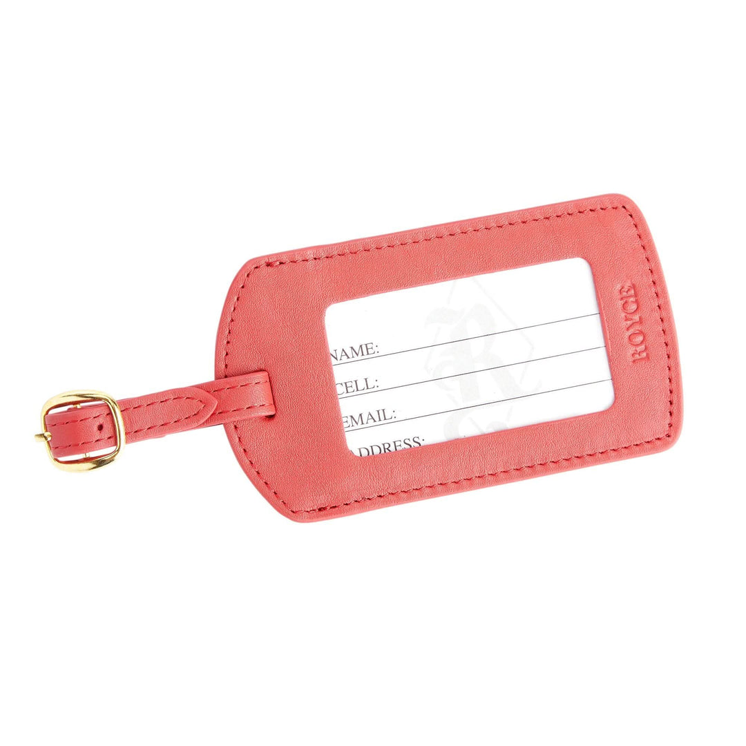 Handcrafted leather luggage tag in coral with gold tone hardware and clear ID window for personalization.