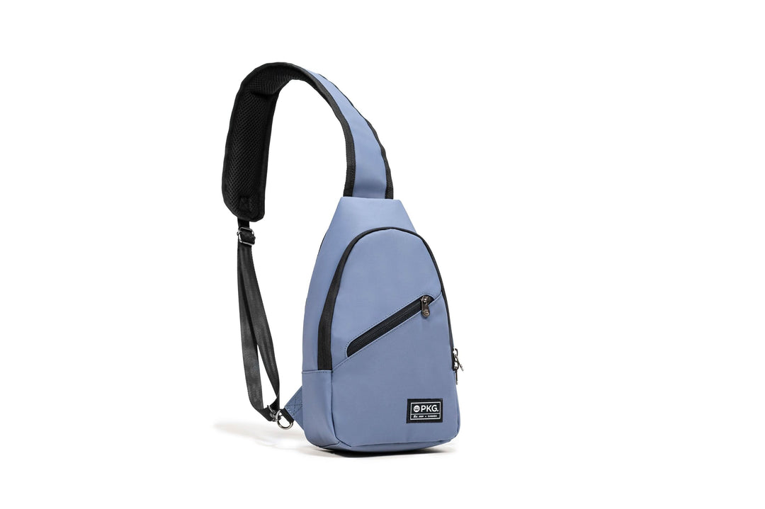 Lightweight Elora Recycled Cross Body pack in soft blue, featuring waterproof material and padded strap, ideal for daily use.