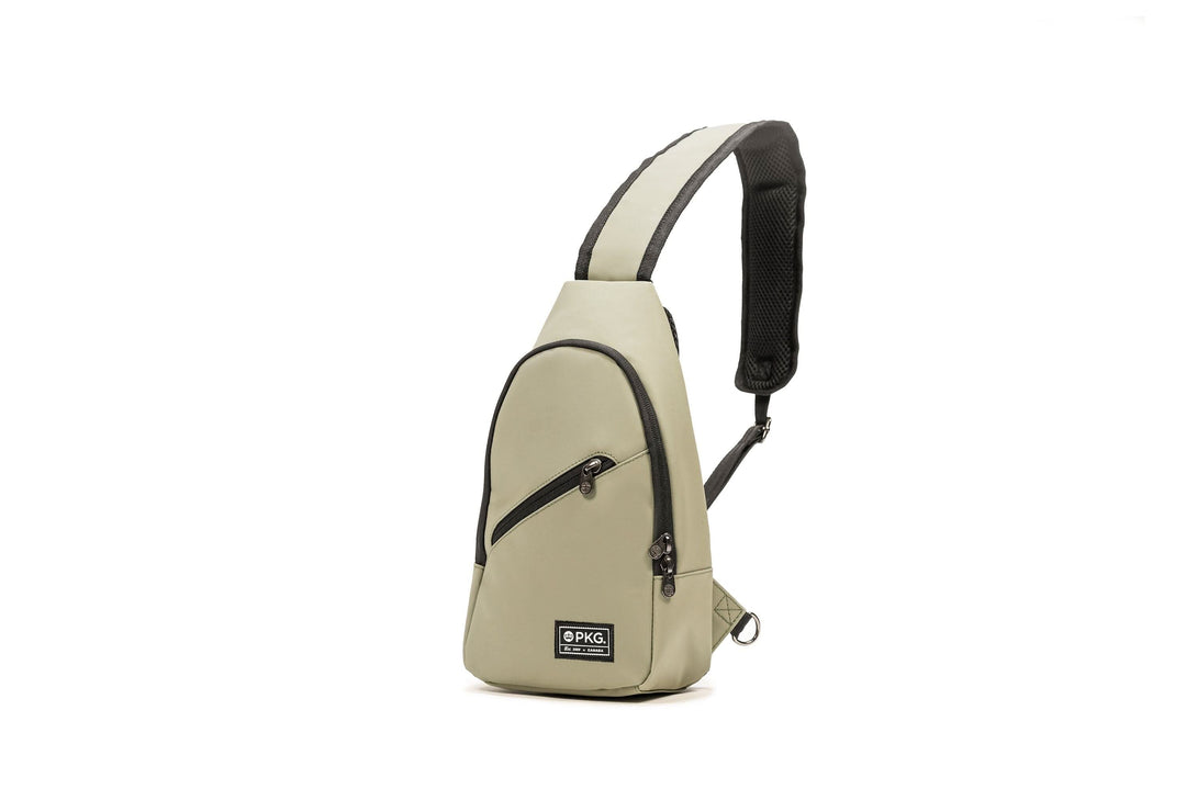 PKG Elora recycled crossbody pack, waterproof materials, padded shoulder strap, lightweight, soft touch matte exterior.