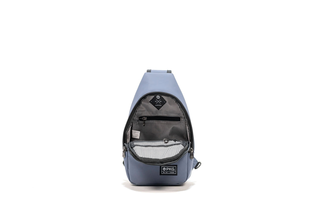 PKG Elora Recycled Cross Body pack, waterproof, padded strap, multiple pockets, matte finish, ideal for daily use.
