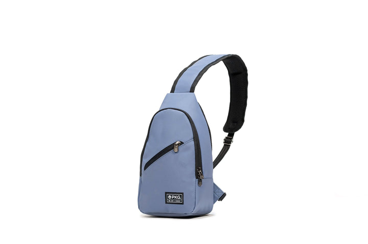 PKG Elora recycled crossbody pack in blue, featuring waterproof material and padded shoulder strap for all-day comfort.